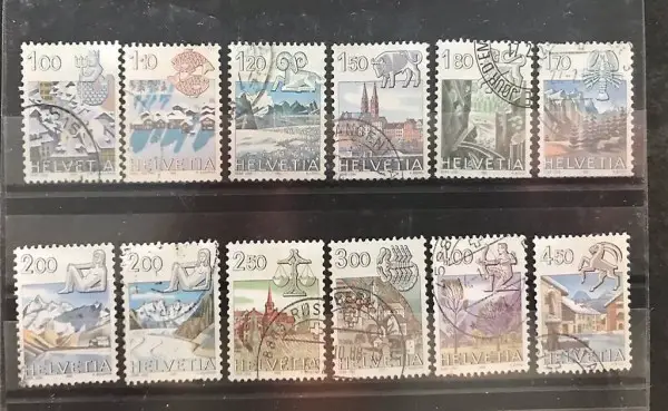 12 francobolli Svizzeri