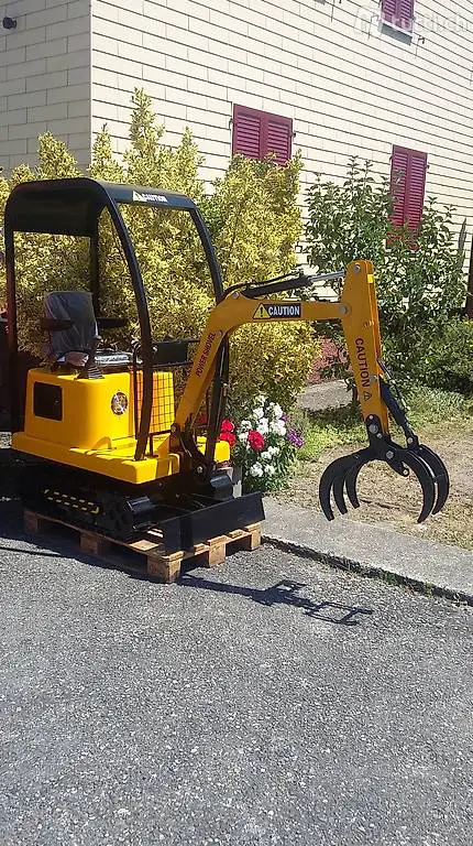 Bagger mit Greifer / Holzgreifer Kinderbagger mit Holzzange