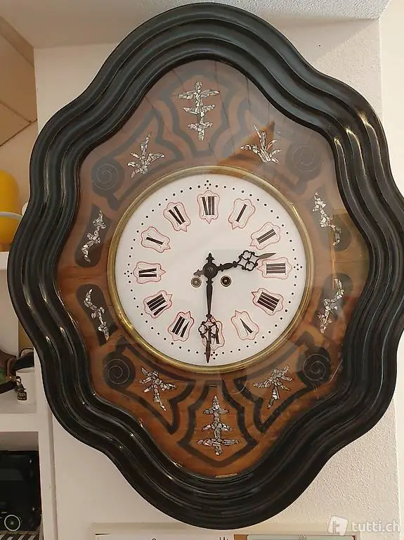 Horloge murale dit Oeil-de-Boeuf